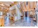 Entryway with slate floors leads to an open floorplan featuring stairs to the upper level at 1057 Reed Ranch Rd, Boulder, CO 80302