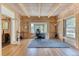 Bright home office with wood beams, large windows, and built-in storage at 1057 Reed Ranch Rd, Boulder, CO 80302