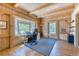 Comfortable office featuring a bay window, wood beams, and carpeted floors at 1057 Reed Ranch Rd, Boulder, CO 80302