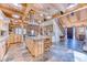 Open floor plan kitchen with custom wood cabinets, granite countertops and an island at 1057 Reed Ranch Rd, Boulder, CO 80302