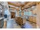 A well-lit kitchen featuring granite countertops, a large island, and modern appliances at 1057 Reed Ranch Rd, Boulder, CO 80302