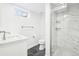 Stylish bathroom with marble countertop, modern fixtures, and glass-enclosed shower at 224 Agate Way, Broomfield, CO 80020