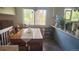 Well-lit dining area adjacent to the kitchen, perfect for Gathering meals and entertaining at 12682 W Louisiana Ave, Lakewood, CO 80228
