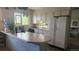 Functional kitchen with eat-at counter and ample storage; a comfortable, practical space at 12682 W Louisiana Ave, Lakewood, CO 80228