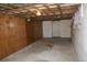 Spacious unfinished basement with exposed ceiling and concrete floor, offering potential for customization at 6363 County Road 20, Longmont, CO 80504