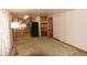 Spacious living room showing connectivity to the kitchen, with classic decor at 6363 County Road 20, Longmont, CO 80504