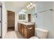 Main bathroom with double vanity and a shower/tub combo at 199 Quebec St # M, Denver, CO 80220