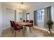 Virtually staged dining room, showcasing a modern dining set at 199 Quebec St # M, Denver, CO 80220