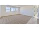 Bedroom with carpet and multiple windows at 39896 Floyd St, Elizabeth, CO 80107