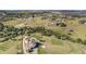 Aerial view showing house, expansive yard, and mountain views at 10385 Grande Vista Ct, Lone Tree, CO 80124