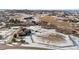 Winter aerial view of house and expansive property at 10385 Grande Vista Ct, Lone Tree, CO 80124
