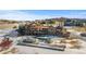 Luxury home with a large backyard, pool, and play area at 10385 Grande Vista Ct, Lone Tree, CO 80124
