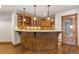Basement wet bar with custom cabinetry and granite countertop at 10385 Grande Vista Ct, Lone Tree, CO 80124