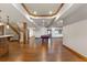 Finished basement with hardwood floors, pool table, and wet bar at 10385 Grande Vista Ct, Lone Tree, CO 80124