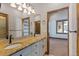 Bathroom with granite vanity and tile shower/tub combo at 10385 Grande Vista Ct, Lone Tree, CO 80124