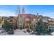 Elegant stone and stucco home with a grand entrance at 10385 Grande Vista Ct, Lone Tree, CO 80124
