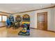 Game room with racing and motorcycle simulators at 10385 Grande Vista Ct, Lone Tree, CO 80124