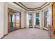 Bright office with large windows, hardwood floors, and French doors at 10385 Grande Vista Ct, Lone Tree, CO 80124