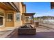 Spacious deck with fire pit and mountain views at 10385 Grande Vista Ct, Lone Tree, CO 80124