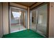 Relaxing balcony accessible through sliding glass doors, offering fresh air and a view of the property at 8330 Zuni St # 214, Denver, CO 80221