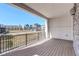 Spacious balcony with wrought iron railings, providing a serene outdoor retreat with neighborhood views at 1778 Peak Loop, Broomfield, CO 80023