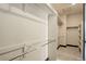 Walk-in closet with ample shelving and hanging space, providing organized storage solutions at 1778 Peak Loop, Broomfield, CO 80023