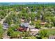 Desirable community with mature trees and mountain views in the background at 1300 W Caley Ave, Littleton, CO 80120