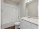 Bathroom with shower/tub combo and white vanity at 453 Interlocken Blvd # 102, Broomfield, CO 80021