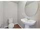 Clean bathroom with toilet, sink, and vanity at 453 Interlocken Blvd # 102, Broomfield, CO 80021