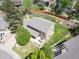 Overhead view of backyard with patio, lawn and manicured garden at 7414 S Monroe Ct, Centennial, CO 80122