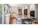 Well-appointed kitchen with a large island, modern appliances, and ample counter space for culinary creations at 7414 S Monroe Ct, Centennial, CO 80122