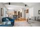 Inviting living room with open layout, modern kitchen, and comfortable seating arrangement at 7414 S Monroe Ct, Centennial, CO 80122