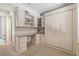 Versatile room with a built-in Murphy bed and integrated desk with storage; ideal for a home office or guest room at 3615 Navajo St, Denver, CO 80211
