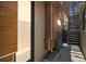 Modern entryway showing the house number, a landscaped garden area, and steps leading to the upper level at 3615 Navajo St, Denver, CO 80211