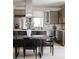 Contemporary kitchen with stainless steel appliances, sleek cabinetry, and an island with seating at 3615 Navajo St, Denver, CO 80211