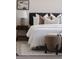 Cozy main bedroom showcasing a well-made bed and decorative lamp, creating a restful environment at 3615 Navajo St, Denver, CO 80211