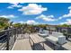 Comfortable outdoor seating on the rooftop deck with views of the surrounding neighborhood at 3615 Navajo St, Denver, CO 80211