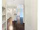 Open floor plan with hardwood floors leading to the kitchen at 7483 S Quail Cir # 635, Littleton, CO 80127