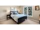 Cozy bedroom with a window that looks out into the yard at 9556 Kemper Dr, Lone Tree, CO 80124