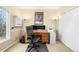 Bright office featuring a desk, ergonomic chair, and plenty of storage space at 9556 Kemper Dr, Lone Tree, CO 80124