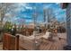 Spacious deck with outdoor seating, ideal for entertaining with beautiful blue sky at 16191 E Hinsdale Ln, Aurora, CO 80016