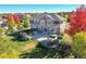 Two-story home with backyard patio and landscaping at 14959 Wistera Way, Broomfield, CO 80023