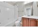 Clean bathroom with a tub, toilet, vanity, and modern fixtures at 14959 Wistera Way, Broomfield, CO 80023