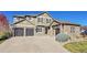 Two-story home with attached two-car garage at 14959 Wistera Way, Broomfield, CO 80023