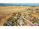 Aerial view of neighborhood with autumn foliage at 14959 Wistera Way, Broomfield, CO 80023