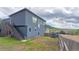 View of backyard featuring fence, hill views, and grassy area at 260 Upper Glenway Rd, Palmer Lake, CO 80133