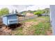 Backyard with wooden fence, chicken coop, and foliage at 260 Upper Glenway Rd, Palmer Lake, CO 80133