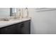 Elegant bathroom vanity features dark cabinets, a modern sink, and stylish fixtures at 260 Upper Glenway Rd, Palmer Lake, CO 80133