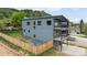 Contemporary two-story home with private balconies and a fenced yard at 260 Upper Glenway Rd, Palmer Lake, CO 80133