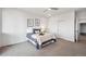 Cozy main bedroom with neutral colors and ample natural light, creating a relaxing atmosphere at 260 Upper Glenway Rd, Palmer Lake, CO 80133